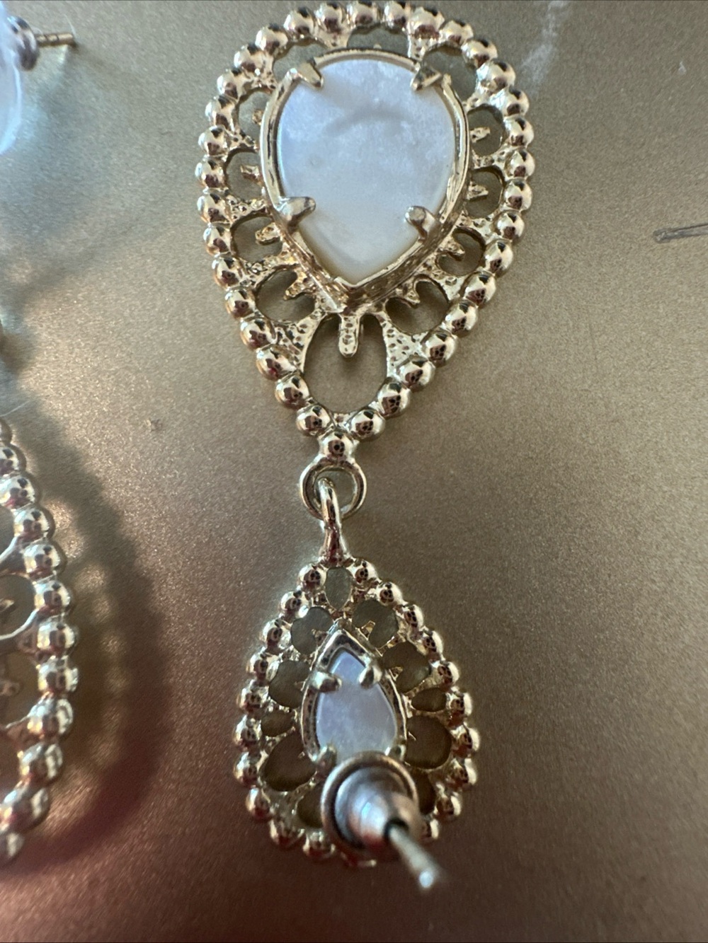 Kendra Scott Gold Teardrop Earrings with Opalescent White Stones - Picture 4 of 4